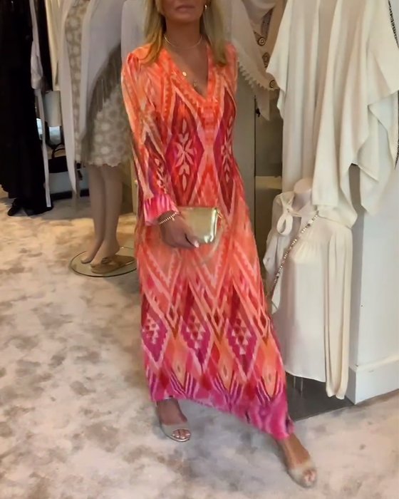 Sukienka z długim rękawem i głębokim dekoltem w kształcie litery V w stylu retro