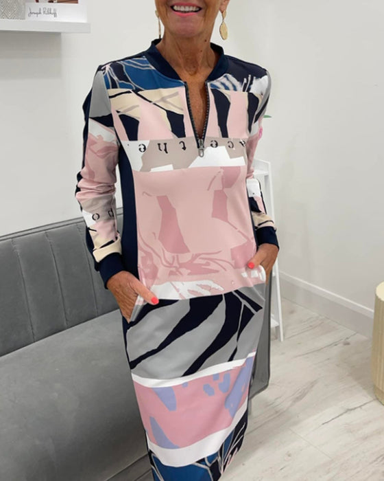 Sukienka z długim rękawem i kieszenią zapinana na suwak w bloki kolorów