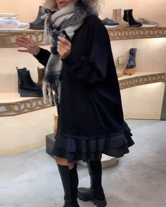 Sukienka o eleganckiej sylwetce i długim rękawie