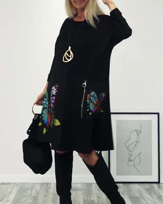 Długa sukienka z kieszeniami i nadrukiem motyli