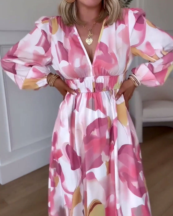 Elegancka sukienka maxi z nadrukiem z długim rękawem i dekoltem w kształcie litery V