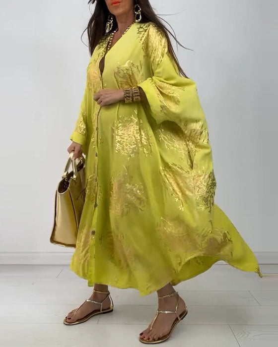 Sukienka z długim rękawem zapinana na guziki