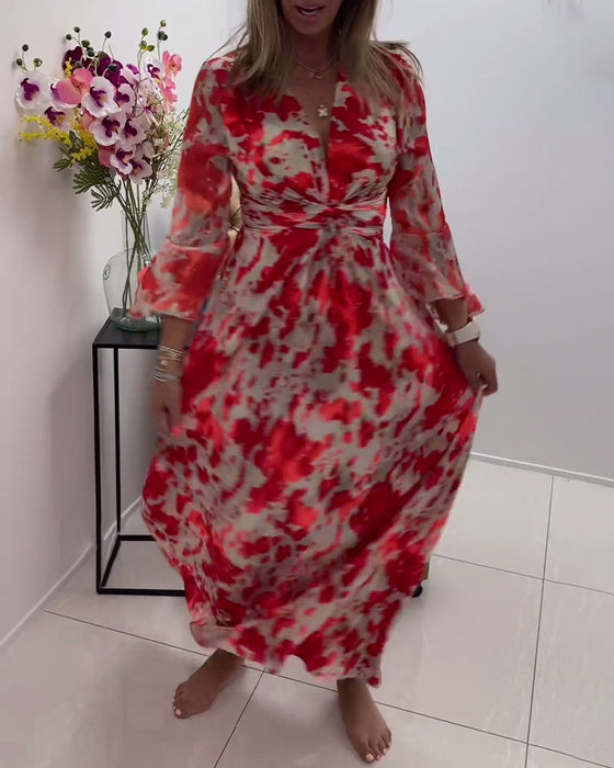 Modna dzianinowa sukienka z głębokim dekoltem w kształcie litery V i nadrukiem