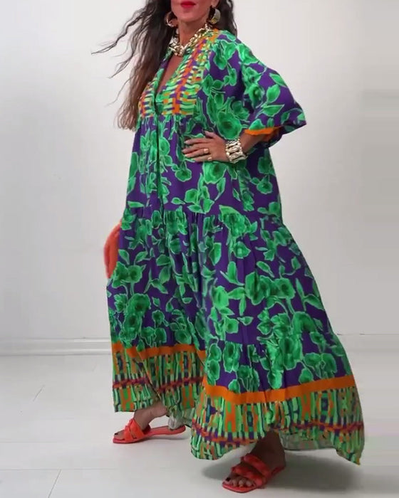 Długa sukienka z nadrukiem i dekoltem w kształcie litery V