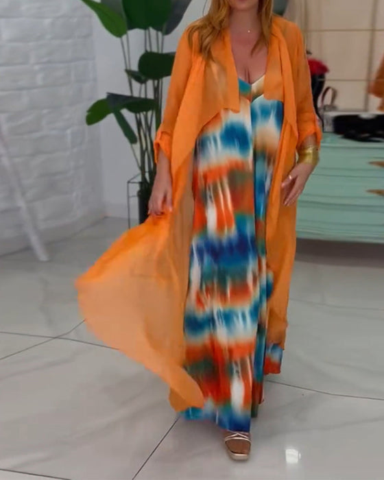 Zestaw kombinezon i kardigan o eleganckim i modnym stylu