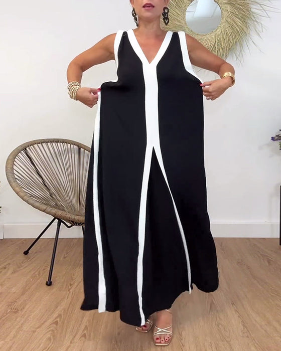 Modna sukienka bez rękawów z kontrastowym nadrukiem i dekoltem w kształcie litery V