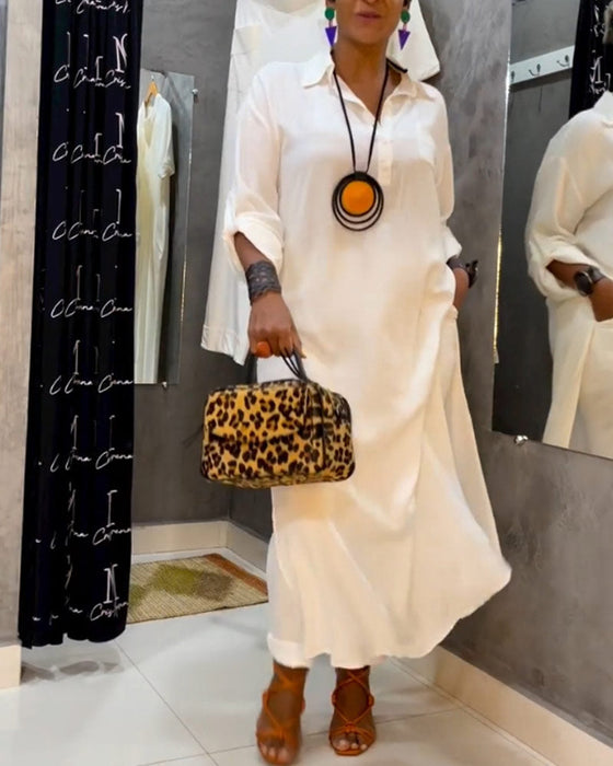 Sukienka z kieszeniami w jednolitym kolorze