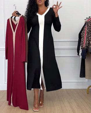 Kontrastowa sukienka z dekoltem w serek i eleganckim rozcięciem