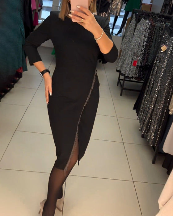 Rozcięta sukienka z okrągłym dekoltem