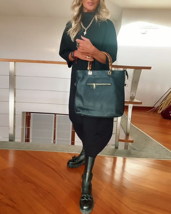 Jednolita luźna swobodna sukienka z wysokim kołnierzem