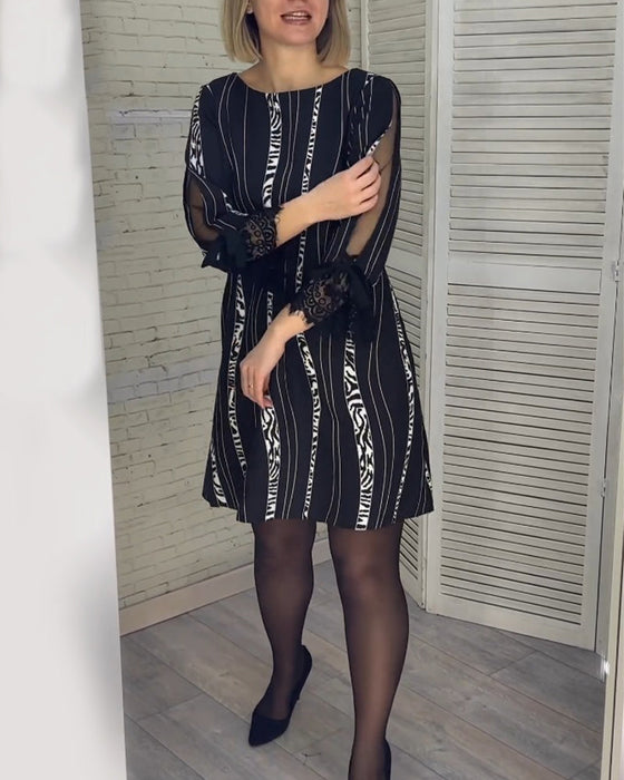 Sukienka do kolan w paski