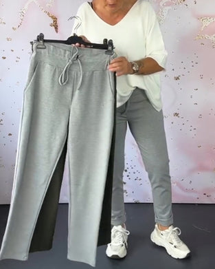 Spodnie casualowe w jednolitym kolorze z kieszeniami i ściągaczem