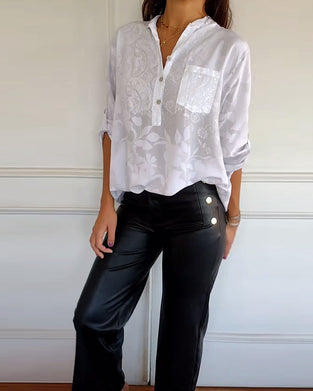 Elegancka koszula w jednolitym kolorze z kieszenią na guziki