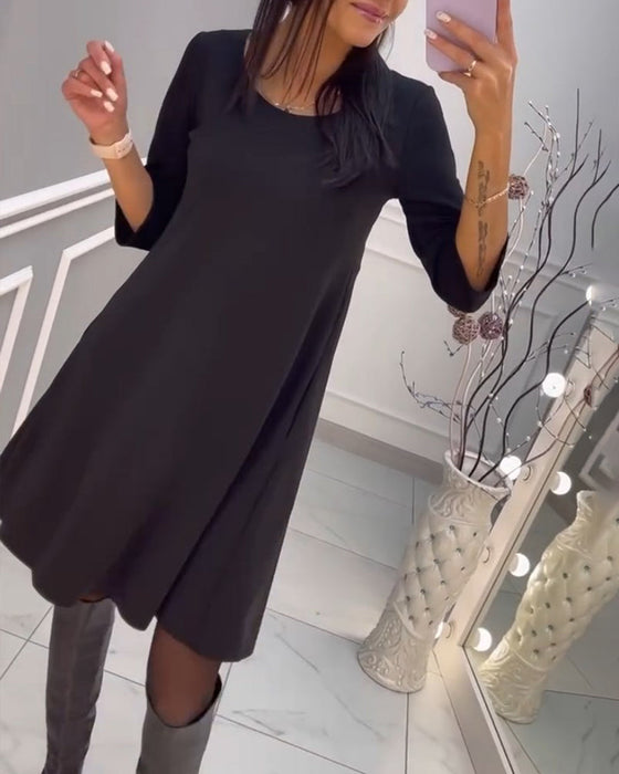 Sukienka w jednolitym kolorze z kokardą z tyłu