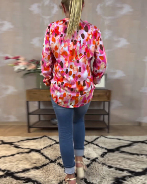 Modna bluzka z kolorowym nadrukiem i długim rękawem z dekoltem w kształcie litery V