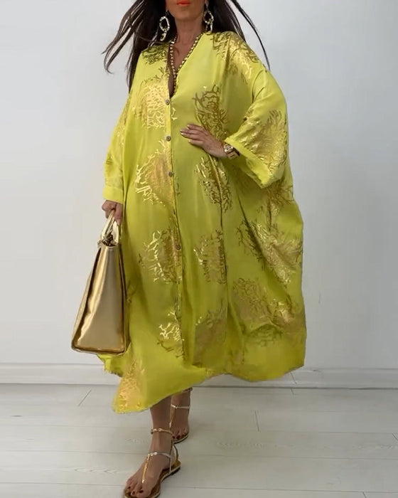 Sukienka z długim rękawem zapinana na guziki