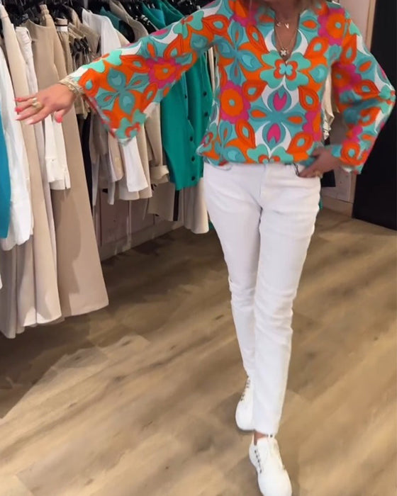 Bluzka o luźnym uniwersalnym fasonie i nadrukach