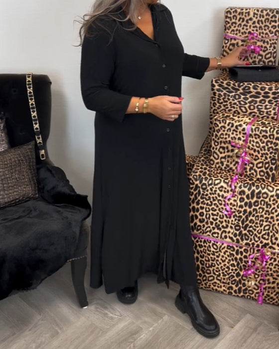 Sukienka zapinana na guziki z dekoltem w kształcie litery V