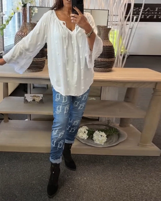 Elegancka bluzka z bufiastymi rękawami