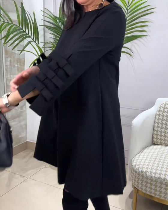 Sukienka do kolan z długim rękawem