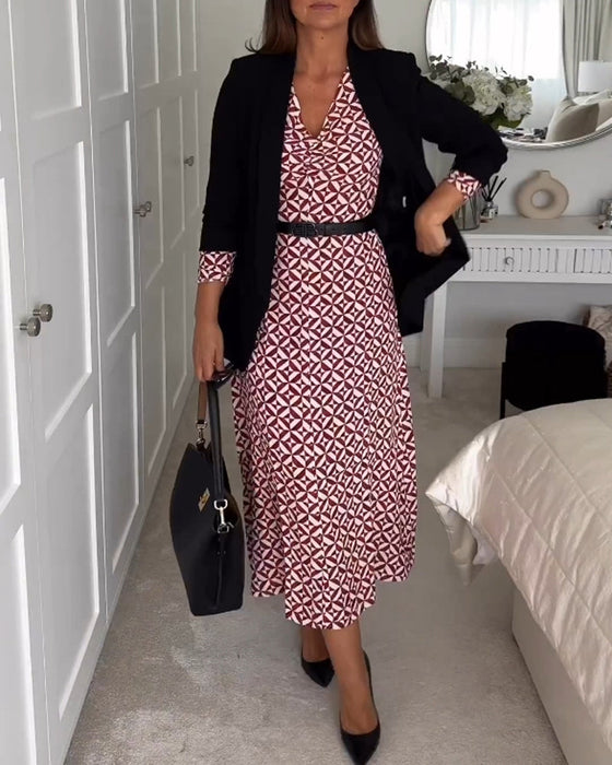 Elegancka sukienka z geometrycznym nadrukiem i dekoltem w kształcie litery V