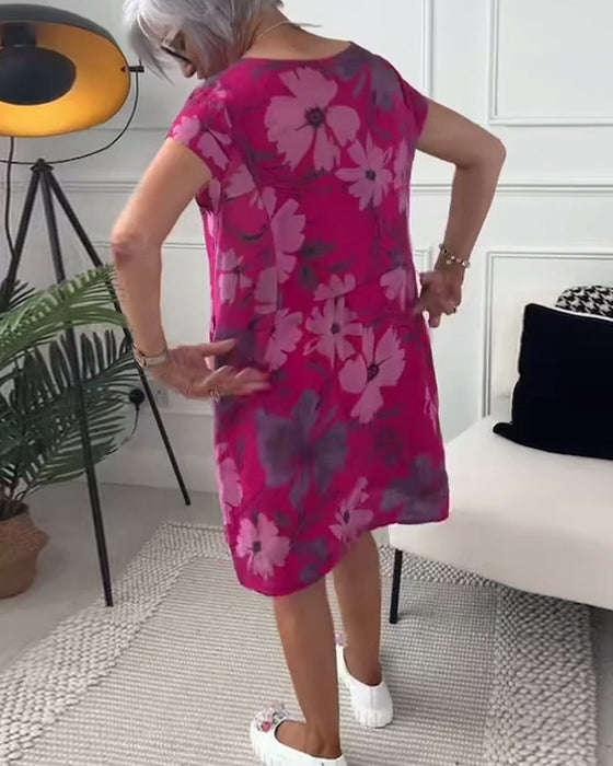 Luźna sukienka z krótkim rękawem i kwiatowym nadrukiem