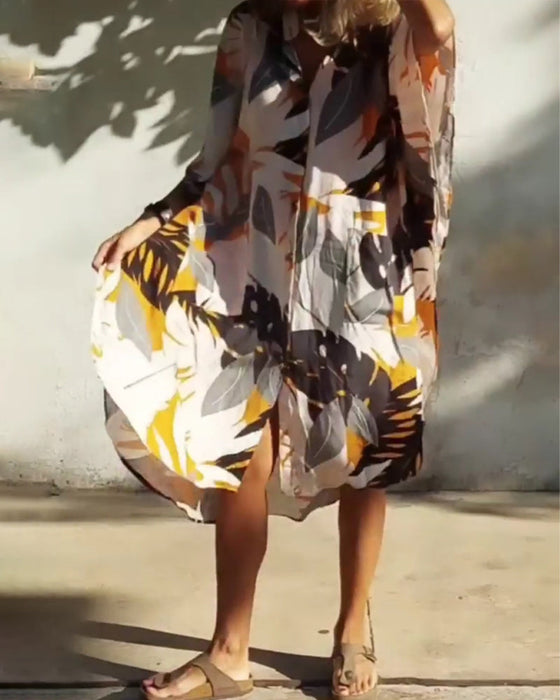 Sukienka z kieszeniami i nadrukiem liści