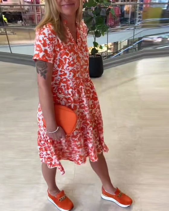 Kwiatowa sukienka midi z krótkim rękawem