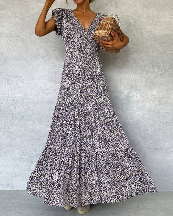 Elegancka sukienka z marszczonymi rękawami i rozcięciem