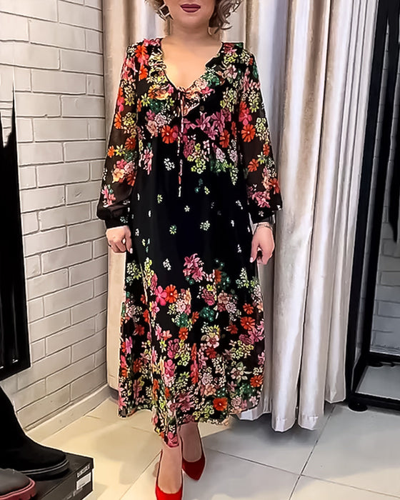 Elegancka sukienka w kwiatowy wzór, z dekoltem w kształcie litery V