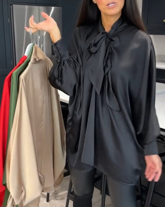 Bluzka w jednolitym kolorze z kokardą