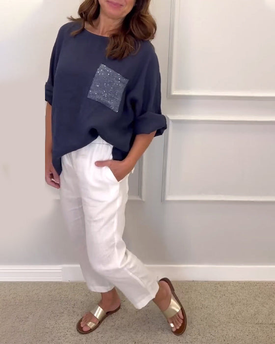 Bluzka z okrągłym dekoltem i kieszeniami z cekinami