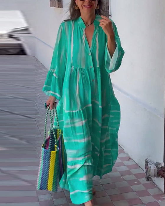 Luźna długa sukienka z dekoltem w kształcie litery V z rozszerzanymi rękawami