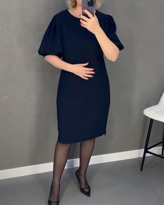 Elegancka sukienka z bufiastym rękawem i krótkim rękawkiem