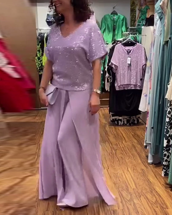 Luźna cekinowa bluzka z krótkim rękawem i dekoltem w kształcie litery V