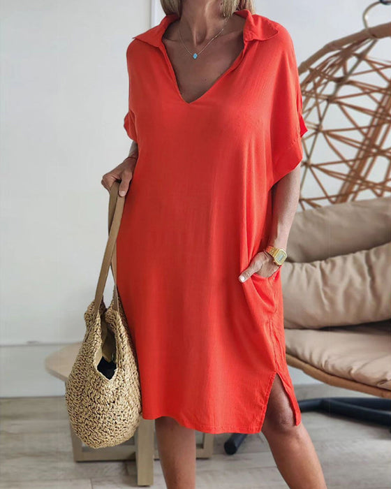 Sukienka z guzikami w jednolitym kolorze z kieszeniami