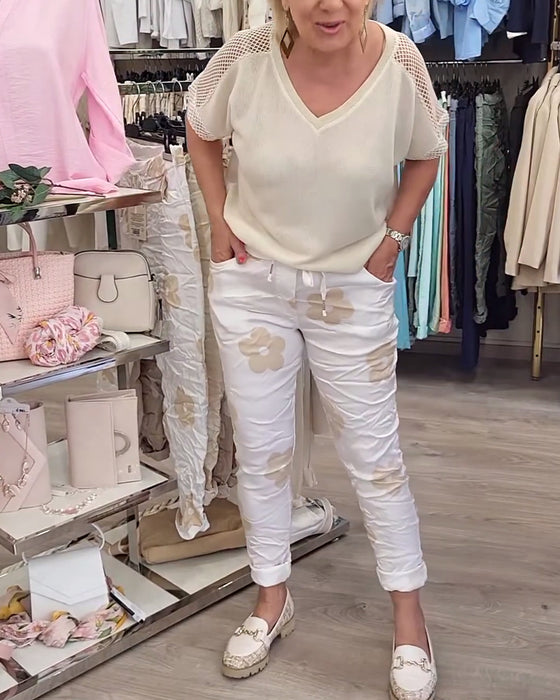 Spodnie casualowe z nadrukiem i ściągaczem