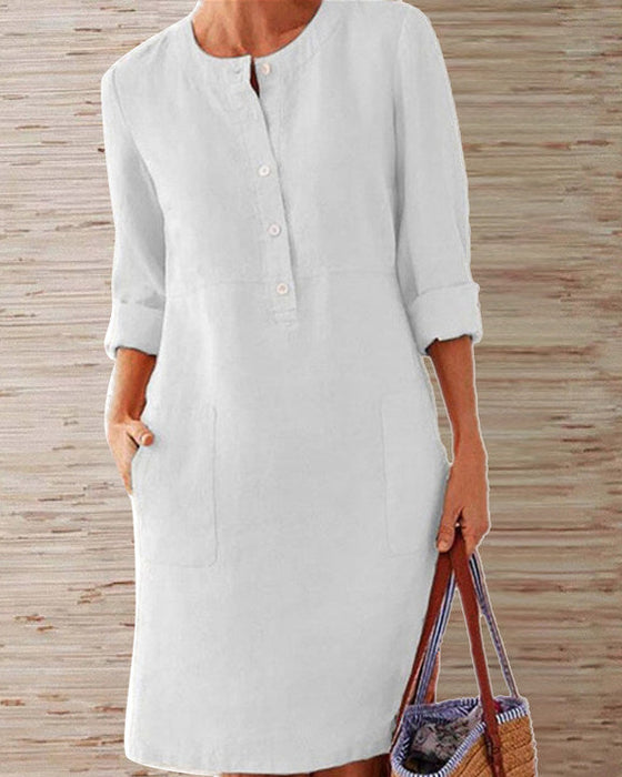 Jednolita sukienka do kolan z okrągłym dekoltem