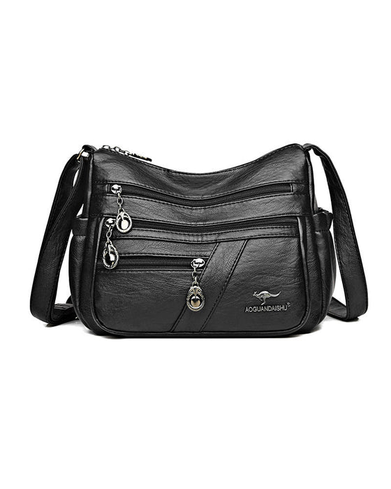Wielokieszeniowa miękka skórzana torebka na ramię (crossbody)
