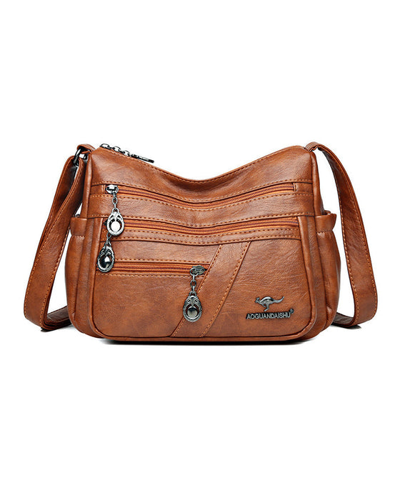 Wielokieszeniowa miękka skórzana torebka na ramię (crossbody)