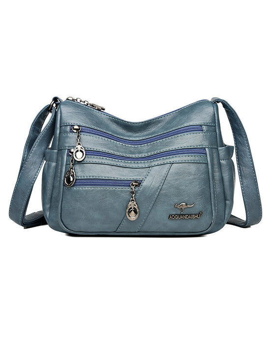 Wielokieszeniowa miękka skórzana torebka na ramię (crossbody)