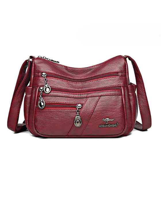 Wielokieszeniowa miękka skórzana torebka na ramię (crossbody)